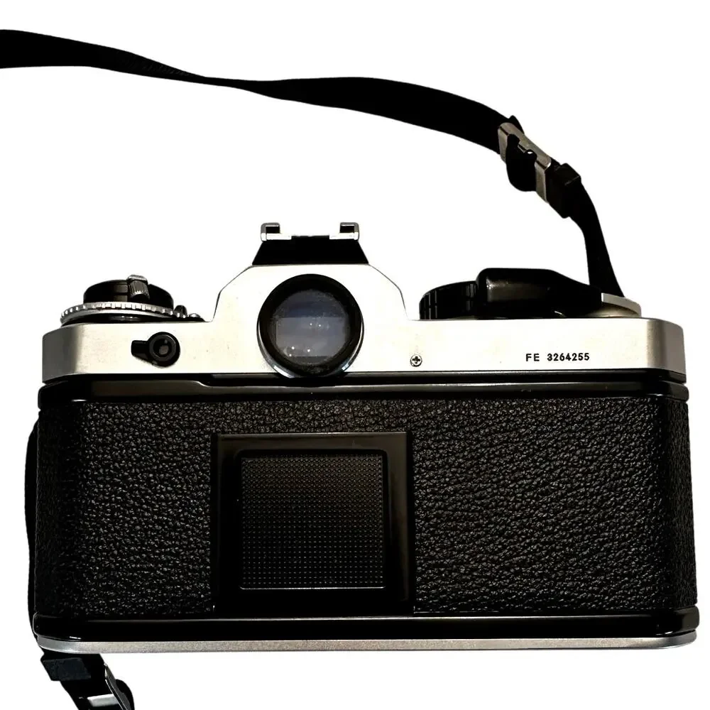Nikon FM 35mm SLR Film Camera with Nikon Series E 150mm 1.8 Lens
